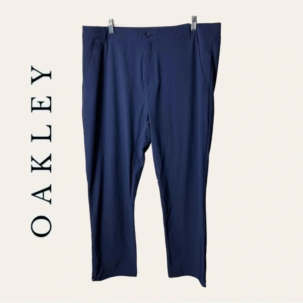 1570. Men’s OAKLEY REGULAR FIT PANTS SIZE 38 NAVY BLUE‎ IN COLOR